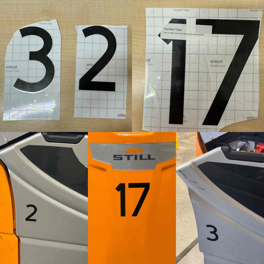 Flurfördermittel Bekleidung mit Vinyl nummerierte Aufkleber auf Gabelstapler in Logistikunternehmen