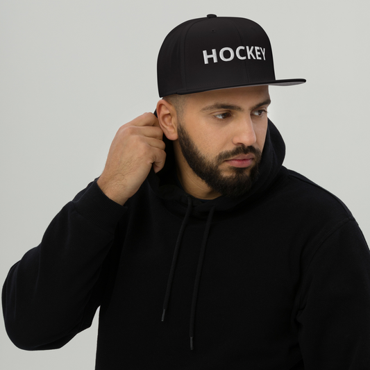 HOCKEY Snapback-Cap schwarz mit Kunststoff-Schnappverschluss und grauem Schirmunterseite