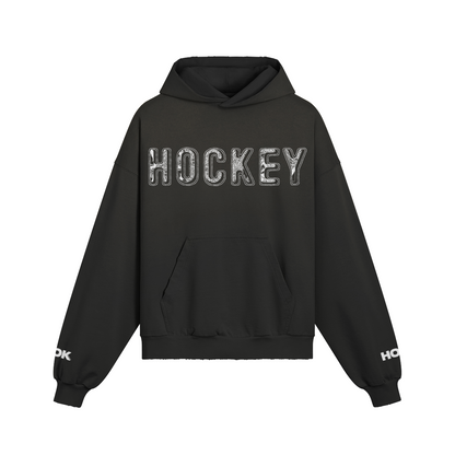 Oversize Hoodie aus 100% Baumwolle mit verwaschenem Effekt und "Hockey" Print vorne und an den Ärmeln, reaktivgefärbt für langanhaltende Farbe